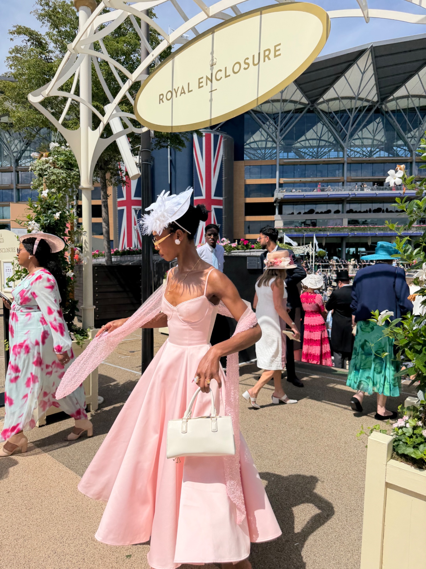 A member walking past the Royal Enclosure sign at Ascot