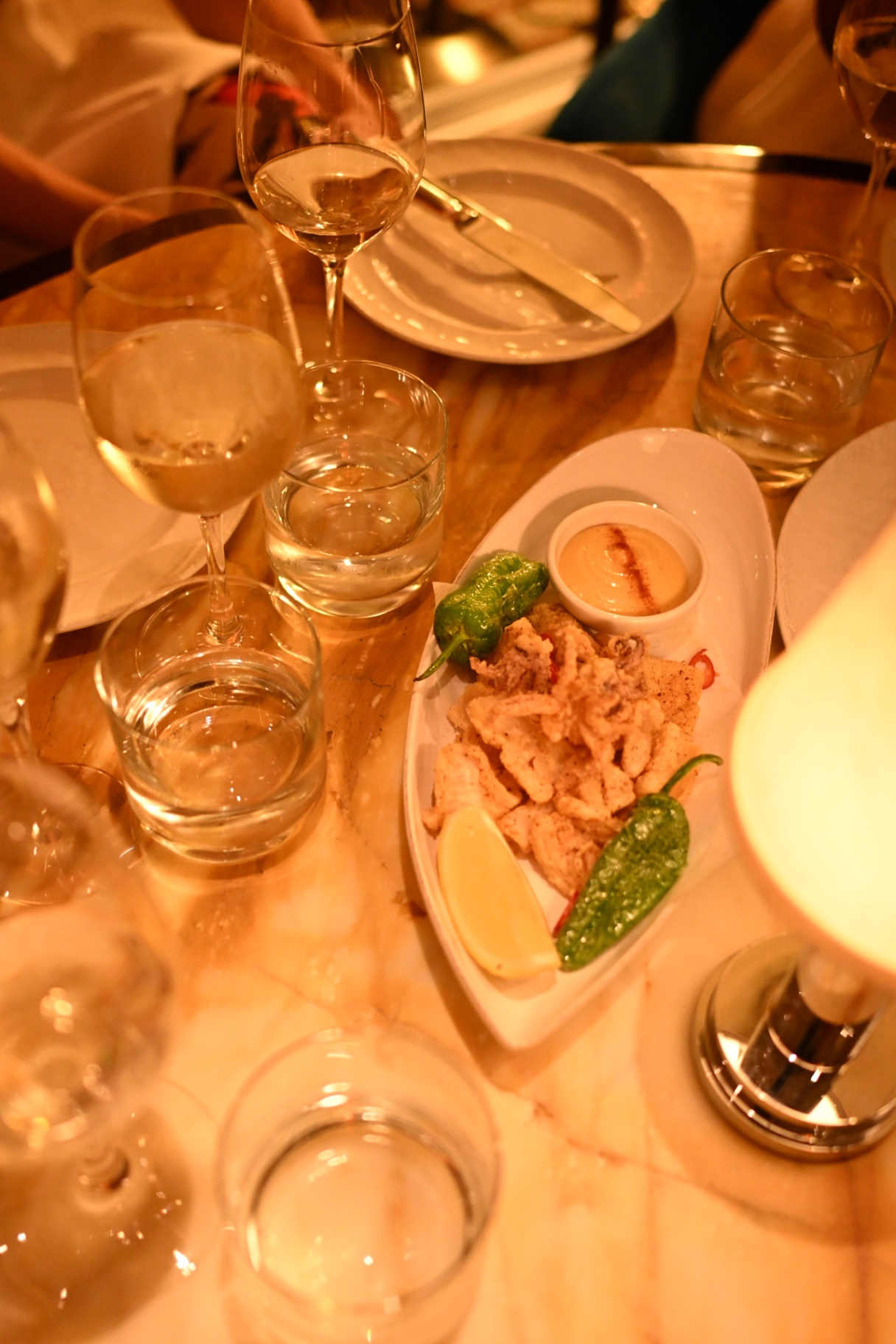 Calamari and wine on the table at the members' dinner